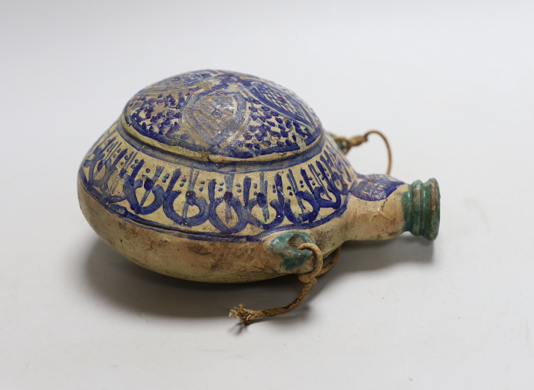 A late 19th century Moroccan pottery flask, 19cms high